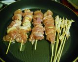A picture of step 4 of Crispy Salt-Grilled Chicken Skewers in a Skillet.