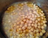 A picture of step 1 of Chickpeas and green peas.