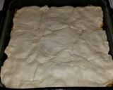 A picture of step 5 of Cheeseburger Biscuit Bake.