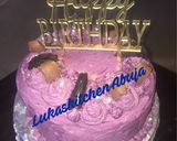 A picture of step 1 of Easy Chocolate And Vanilla Birthday Cake with purple frosting.