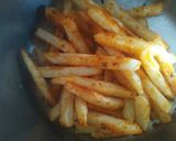 A picture of step 1 of French fries pizza.
