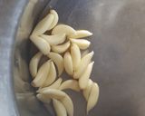 A picture of step 2 of Lebanese hummus with pitabread.