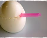 A picture of step 2 of Charaben Side Dish Flower Egg Carved with a Straw.
