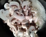 A picture of step 4 of curry mushrooms and peppers in a sauce.