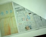 A picture of step 2 of Castella Cake in a Newspaper Mold.
