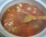 A picture of step 3 of Simmered Udon Noodle Hot Pot with Melting Cheese and Tomato.