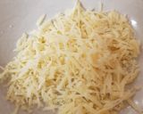 A picture of step 6 of Parmesan smashed Roast Potatoes.