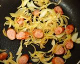A picture of step 4 of Stir Fried Udon Noodles with Melting Cheese and Fluffy Eggs.