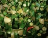A picture of step 3 of Bhindi fry with potato.