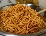 A picture of step 2 of Butterscotch & Peanut Butter Chinese Noodle "Spider" Cookies.