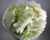 A picture of step 1 of Stir Fried Cabbage and Walnuts with Lemon Butter.
