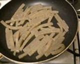 A picture of step 2 of Stir-Fried Garlic Chives & Konnyaku for Dieters.