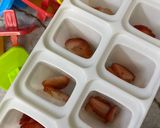 A picture of step 6 of Strawberry Popsicles.