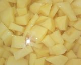 A picture of step 2 of Curry cous cous with Irish potatoes sauce.