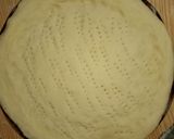 A picture of step 12 of Chicken Malai boti creamy floral pizza in pateela.