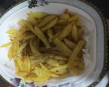 A picture of step 4 of 3 spice fries.