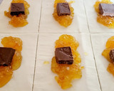 Foto del paso 4 de la receta: Cañas de hojaldre rellenas de turrón de chocolate y mermelada de naranja