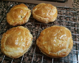 Foto del paso 6 de la receta: Bollitos de hojaldre rellenos de chocolate