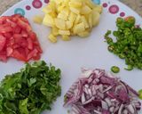 A picture of step 3 of Alunimki (Nepalese street snacks).