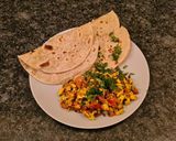 A picture of step 7 of Fulka with paneer bhurji.