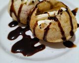 A picture of step 7 of Chocolaty Panipuri Bombs.