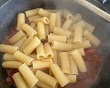 A picture of step 6 of Rocket sundried tomato rigatoni.