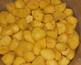 A picture of step 2 of Curried potatoes.
