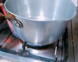 A picture of step 1 of Karak doodh pati.
