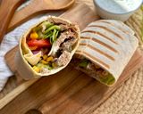 Foto del paso 5 de la receta: Wrap de cerdo estilo Kebab con salsa de yogur