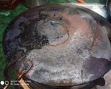 A picture of step 6 of Grill Chicken in pan.