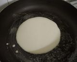 A picture of step 3 of Banana cheese stuffed pancake.