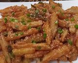 A picture of step 15 of Crispy honey chilli potato.