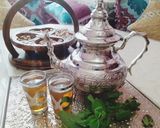 A picture of step 5 of Moroccan Mint Tea.