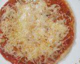 A picture of step 4 of Naan pizza.