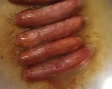 A picture of step 3 of Sumptuos Fried Beef Sausages using very little oil.