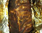 A picture of step 24 of Spiced Smoked Ribs with Orange Soda Sauce.
