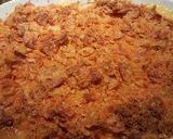 A picture of step 7 of Doritos chicken and broccoli rice casserole.