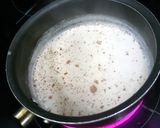 A picture of step 2 of Milkyway bedtime drink.