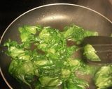 A picture of step 3 of Chicken folds with cheesy spinach.