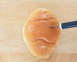 A picture of step 3 of Halloween Ghost Sandwich.