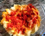 A picture of step 4 of Mango pickle with asafoetida.