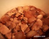 A picture of step 8 of Braised Pork with Daikon Radish.