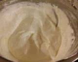 A picture of step 23 of Lemon Layer Cake with Blackberrie Cream Filling and a Lemon Cream Frosting.