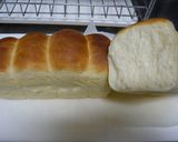 A picture of step 10 of Simple Fluffy Mini Bread Loaves Using a Pound Cake Pan.