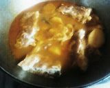 A picture of step 11 of Egg Omelet Curry.