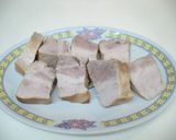 A picture of step 4 of Pork Belly Simmered with Daikon Radish.