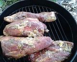 A picture of step 6 of Pork brisket on the grill with semi- dry rub.