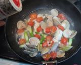 A picture of step 5 of Easy Cod and Hamaguri Clam Acqua Pazza.