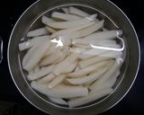 A picture of step 1 of Homemade Crispy French Fries.