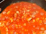 Berenjenas rellenas de pollo, jamón y salchichas al horno